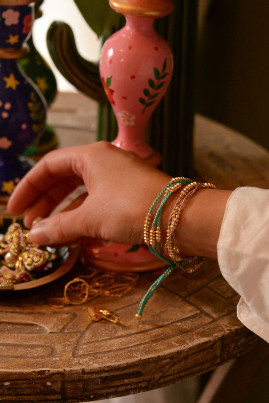 PALE PINK ROPE GOLD METAL BEAD BRACELET