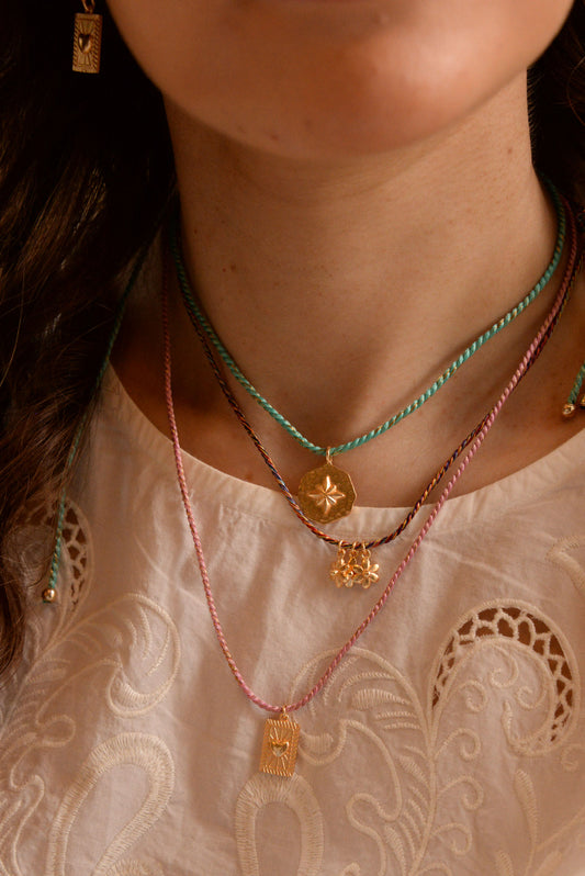 STAR ROUND CHARM ON TURQUOISE BLUE THREAD NECKLACE