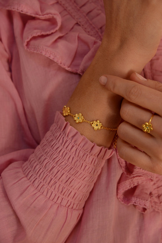 GOLD HAMMERED FLOWER BRACELET (8108054544600)