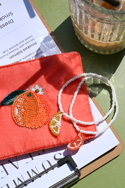 ORANGE SLICE ON PEARL SEED BEAD BRACELET