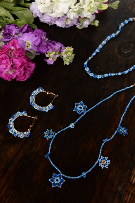 BLUE BEADED CHARM NECKLACE