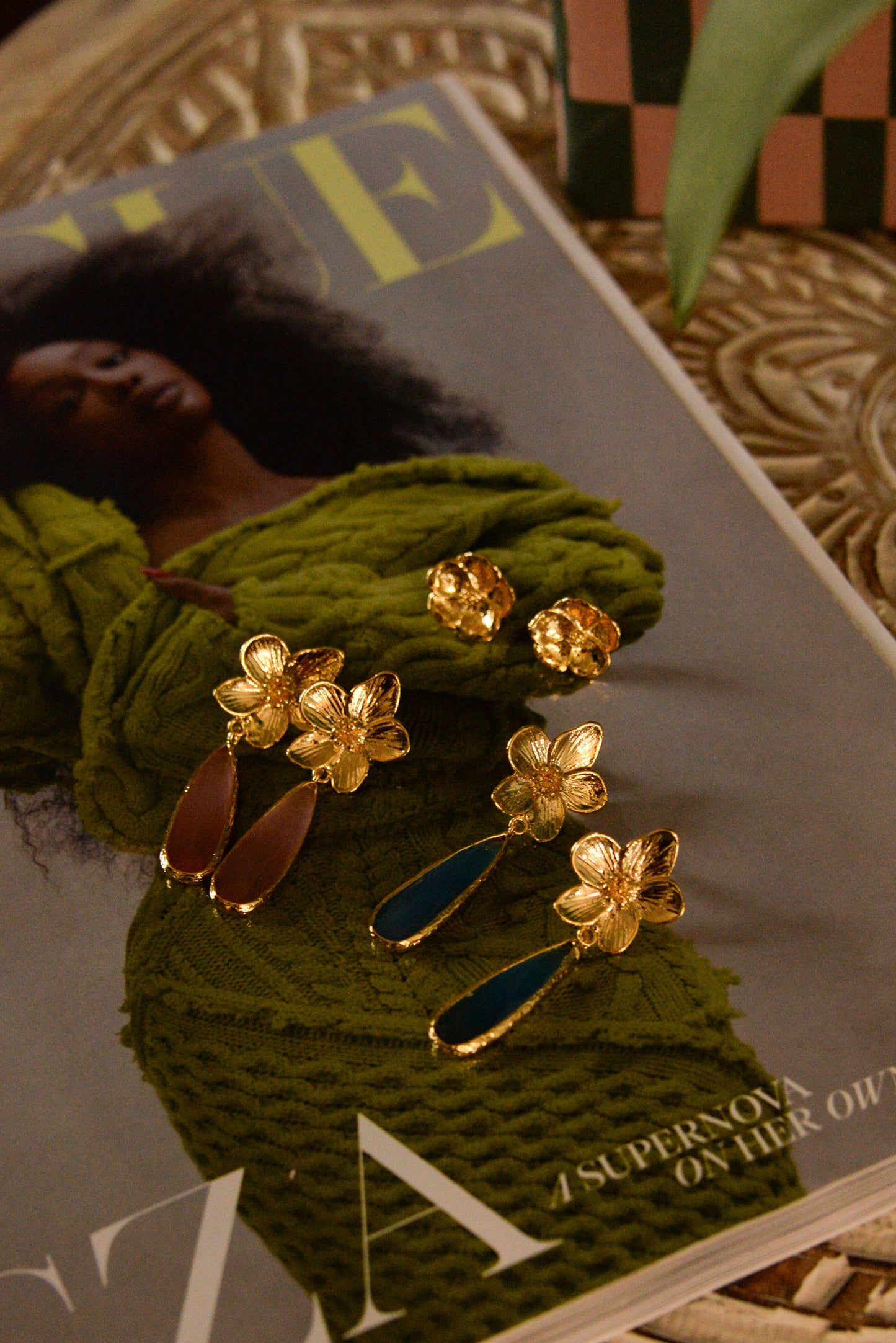 GOLD FLOWER AND BLUE GLASS TEAR DROP EARRINGS