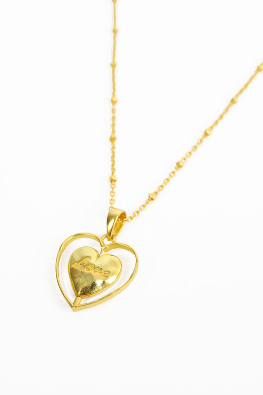 SPINNING GOLD HEART PENDANT (8108079284440)