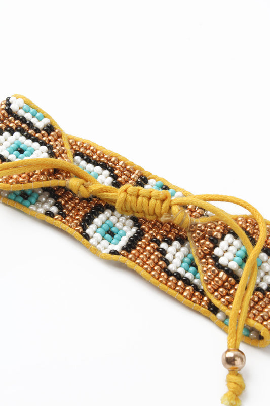 BEADED GOLD MULTI EVIL EYE BRACELET