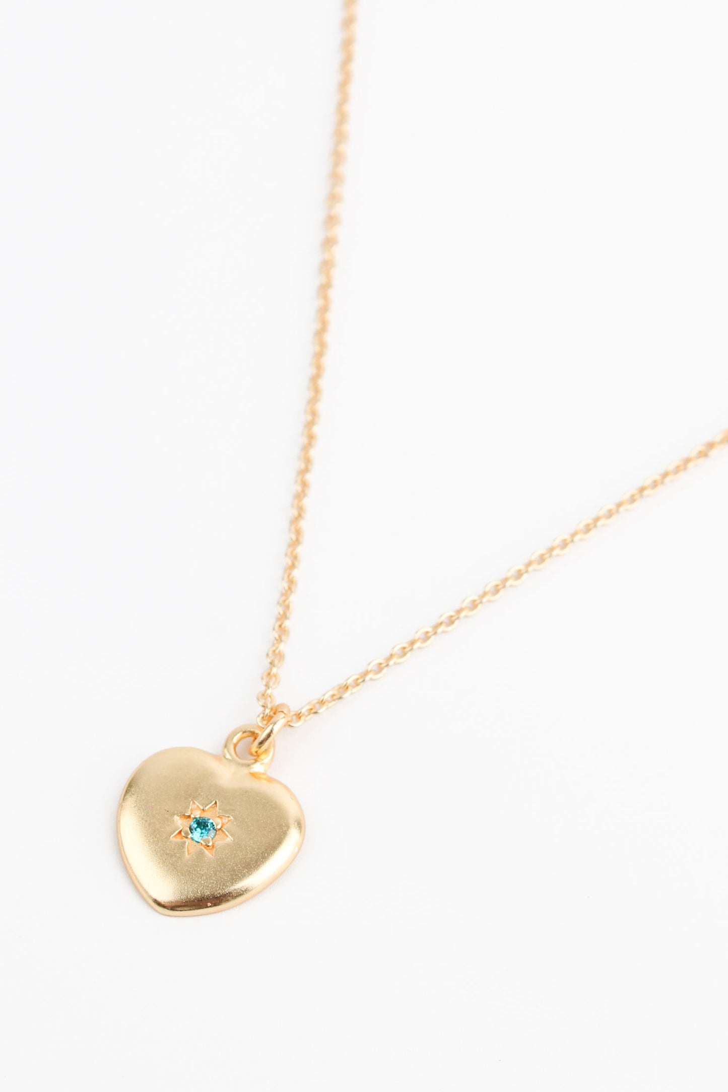 BLUE CRYSTAL STARBURST HEART PENDANT NECKLACE