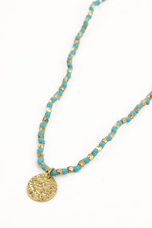 GOLD AND THREAD WITH COIN PENDANT