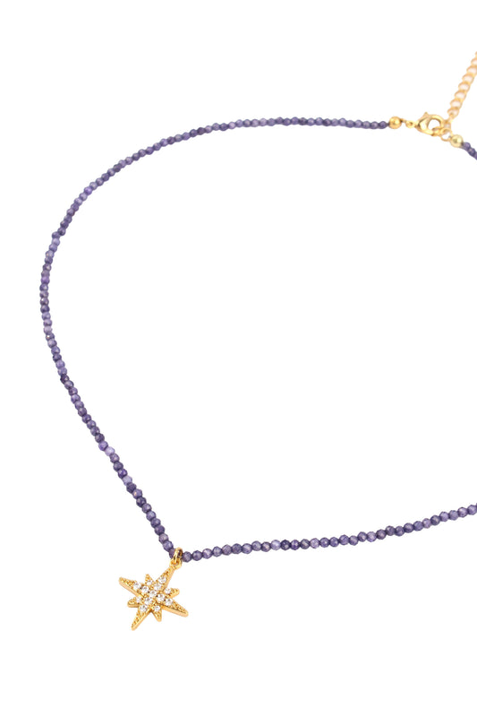 GOLD CZ STAR CHARM ON BLUE BEADED NECKLACE