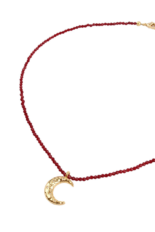 GOLD MOON CHARM ON WINE BEADED NECKLACE