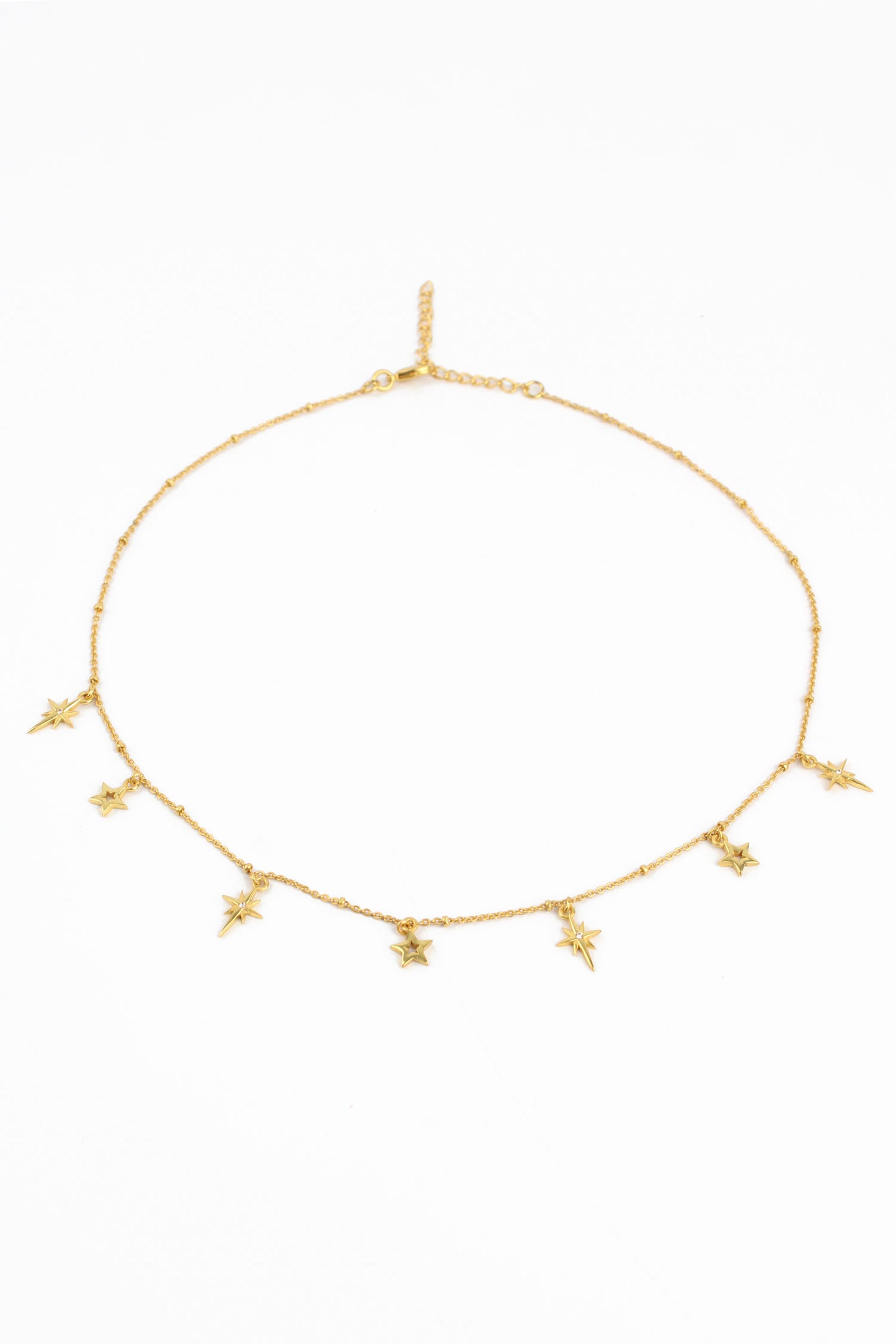 GOLD STAR CHARM NECKLACE