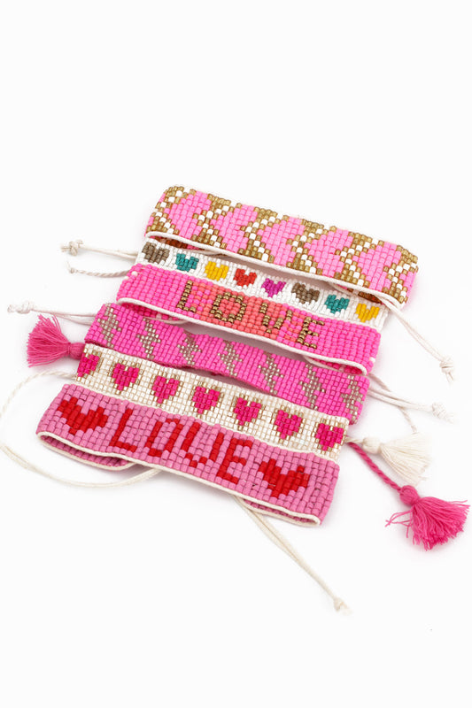 PACK OF 6 PINK AND HEARTS BRACELETS