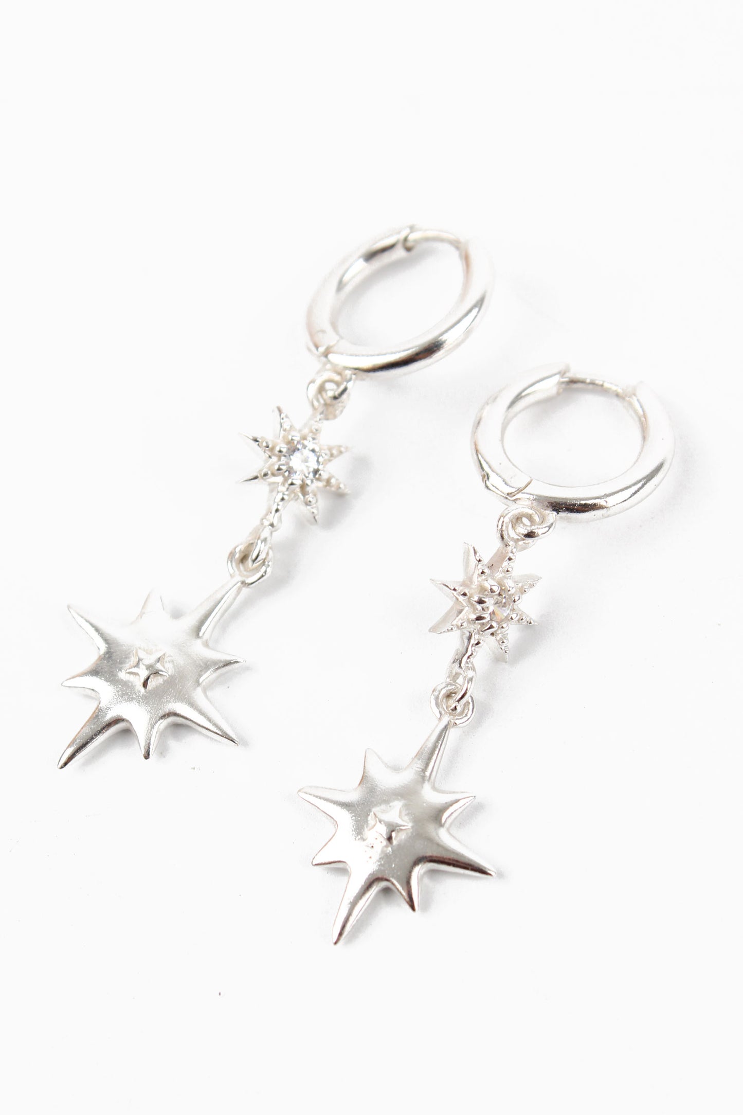 SILVER DOUBLE STAR HUGGIE HOOP EARRING