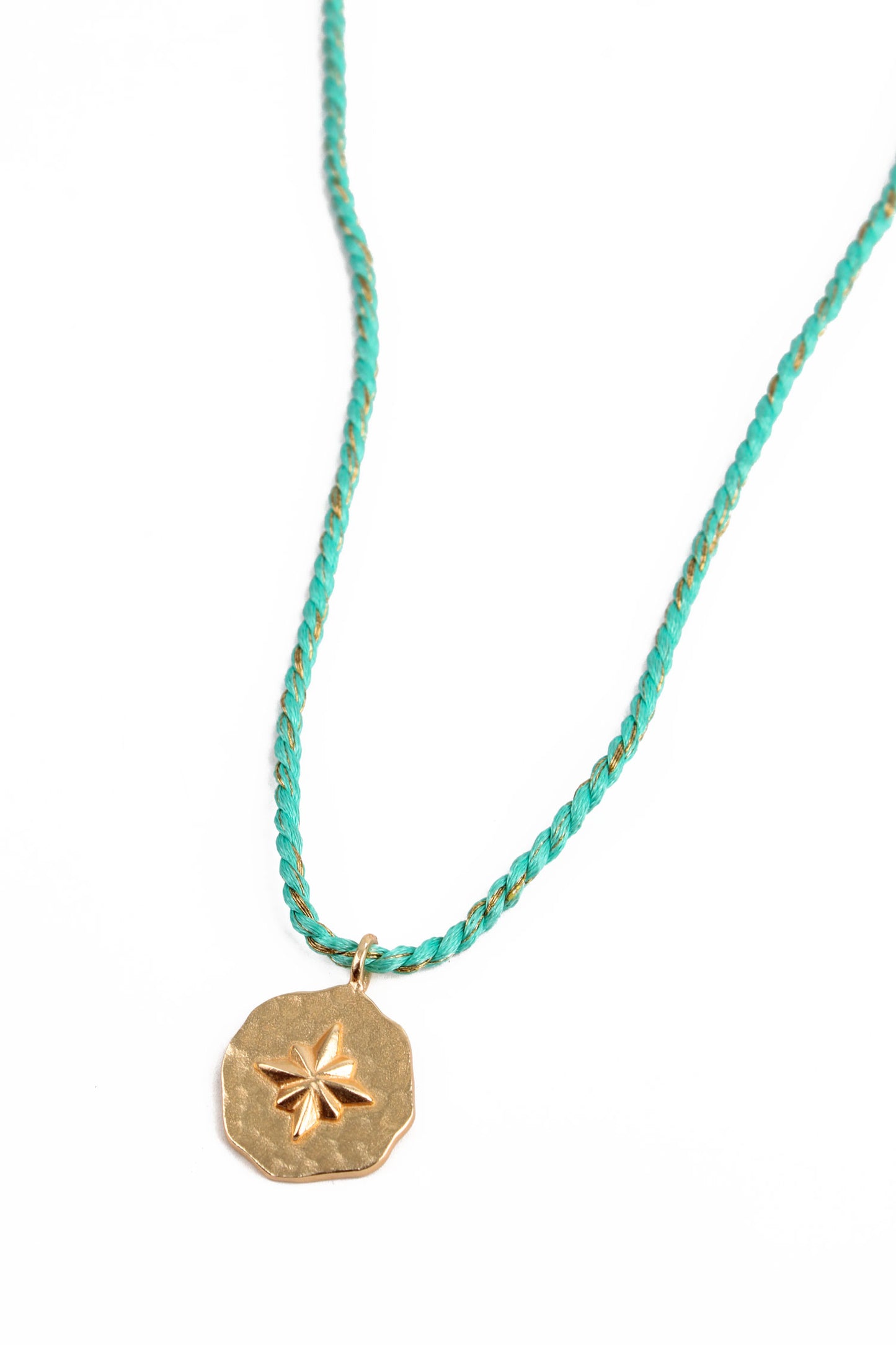 STAR ROUND CHARM ON TURQUOISE BLUE THREAD NECKLACE