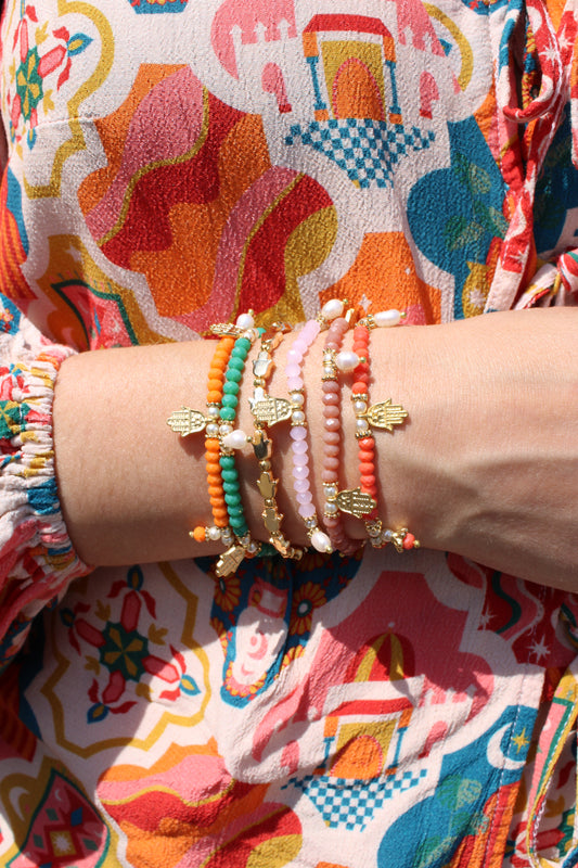 FACET GLASS HAMSA HAND CHARM BRACELET. (7718398886104)